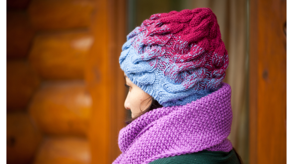 Type of product photography showing knit hat and scarf being worn by a woman