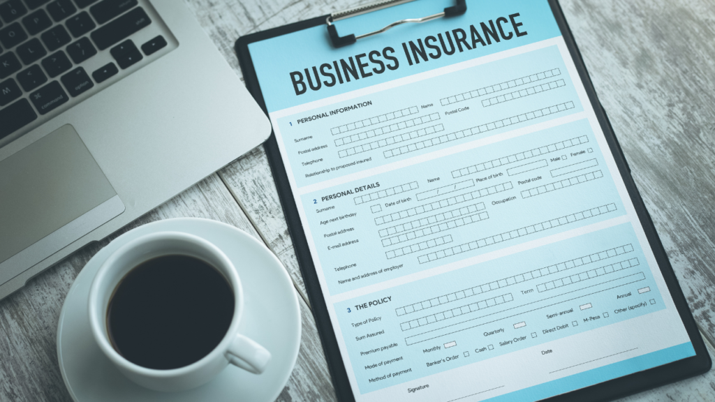 form for craft business insurance next to a laptop and cup of coffee